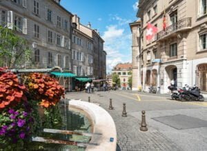 fontaine vue place du bourg de four vieille ville Geneve emplacement bureaux suisse coworking